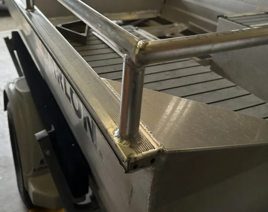 Aluminum rail post welded at the bow of a boat