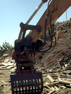 Excavator thumb Neal repaired out on a job site